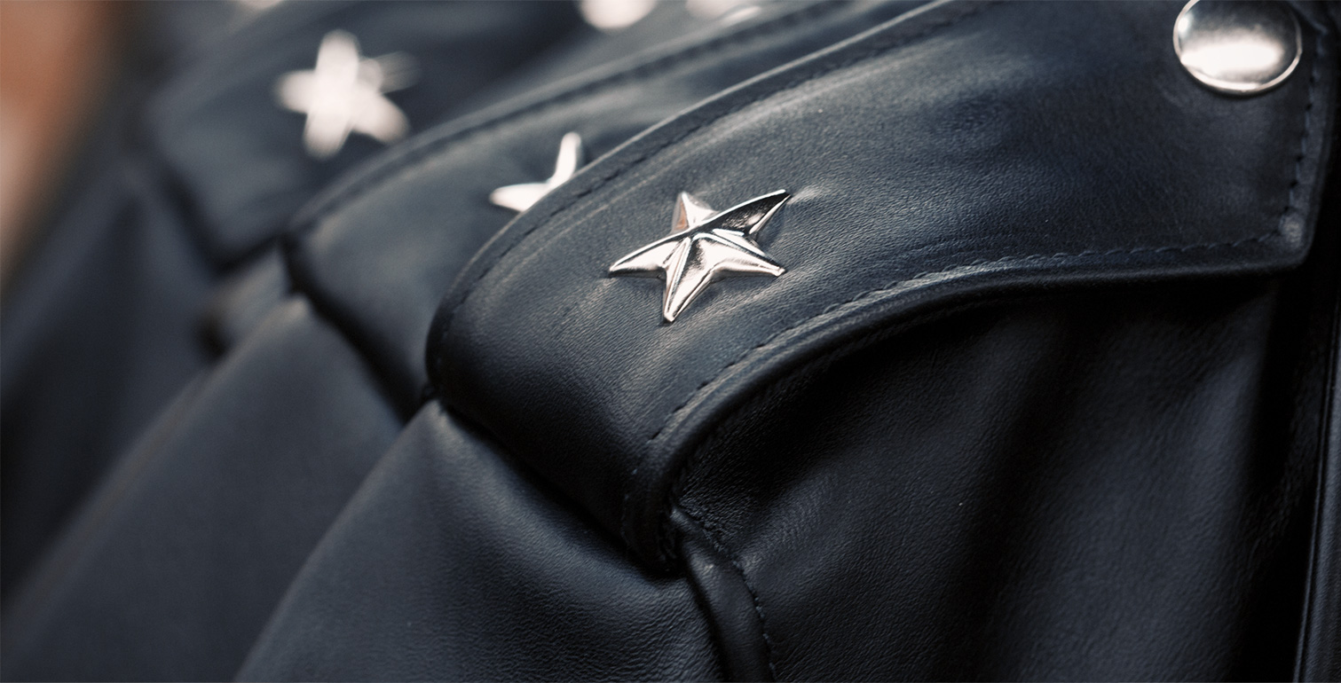 Star hardware details showing on a leather jacket